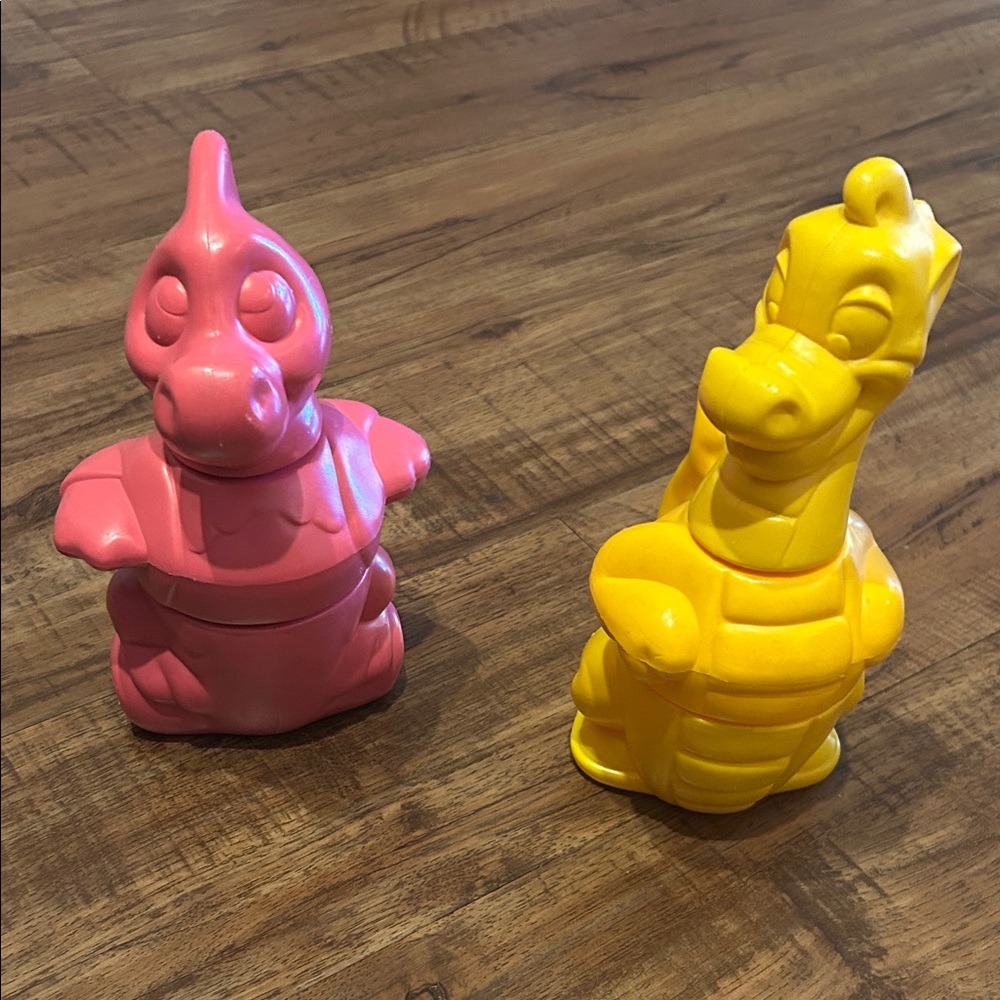 Tupperware Pink and Yellow Dinosaur Figures